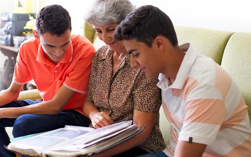 Family looking at photos.