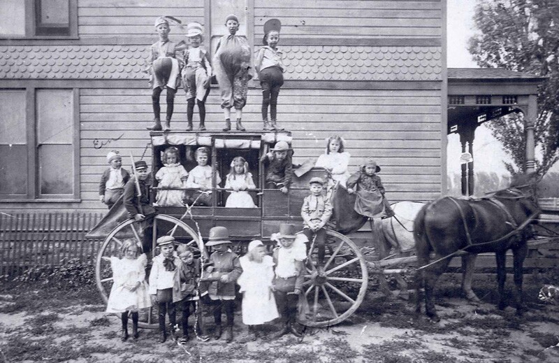 Photo of children in Halloween costumes, taken in 1900s.