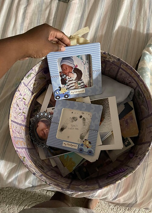 One baby book idea is to keep baby keepsakes in a box.