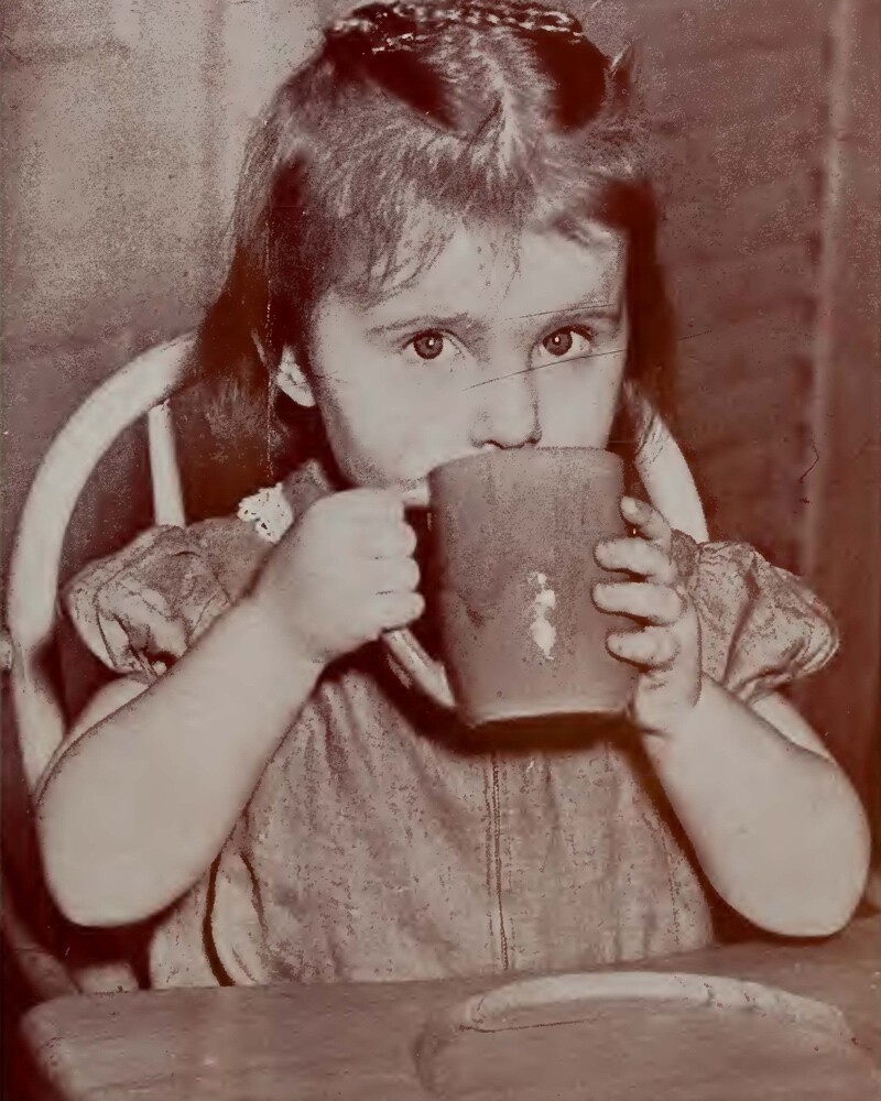 silent generation girl drinking from cup