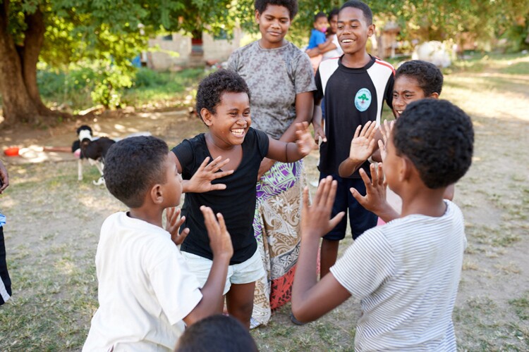 Fijian children playing outside