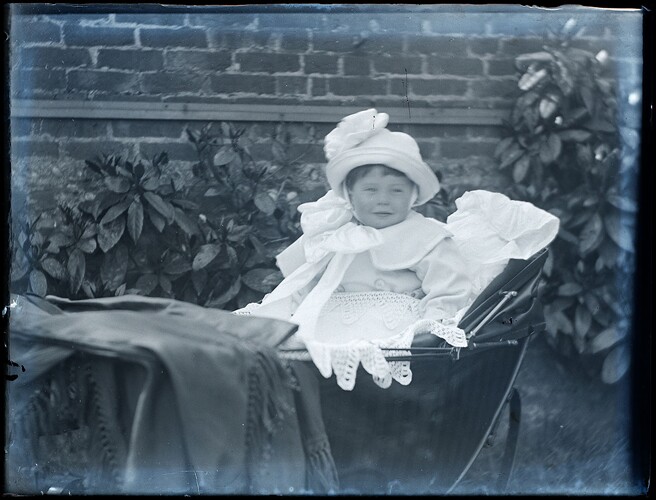 1900s baby in a stroller