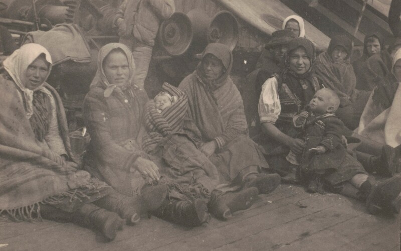 Emigrants from eastern Europe on the deck of a boat.