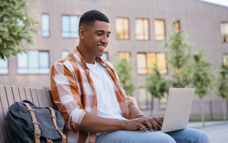 Man working on a computer to review items in Get Involved.
