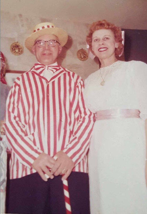 Couple dressed in 1910s clothing for Halloween.