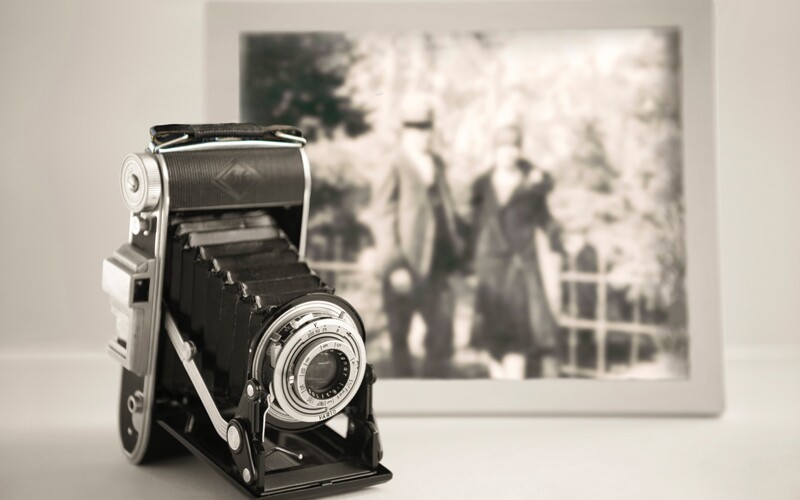 An old camera and a photo.