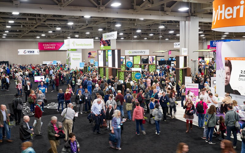 People walk around RootsTech