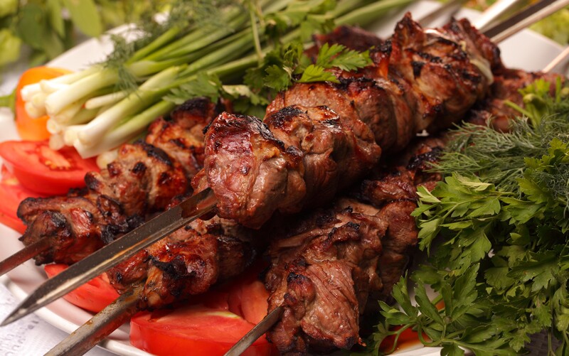 Brazilian churrasco, barbecue meat on skewers.
