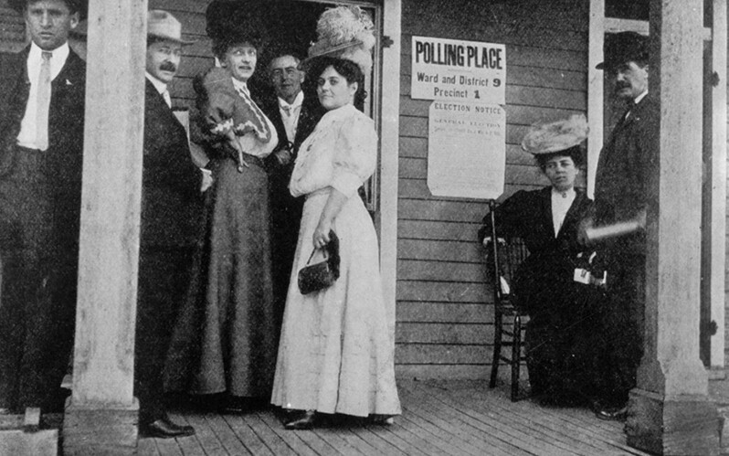 A historical image of a woman's first time voting.