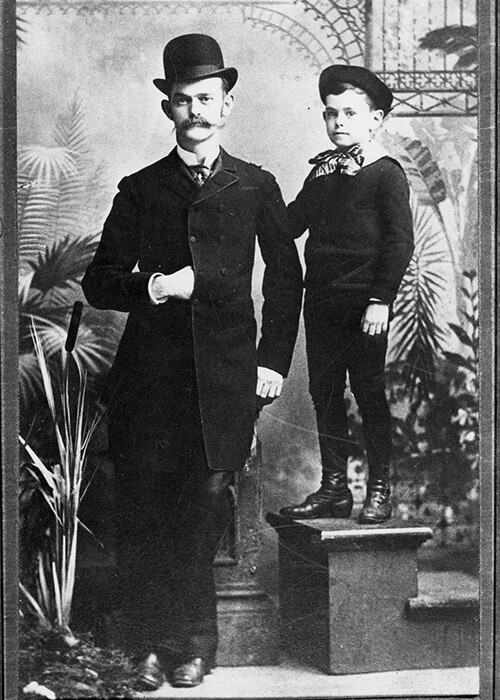 A man and a young boy wearing similar fashion in the 1880s.