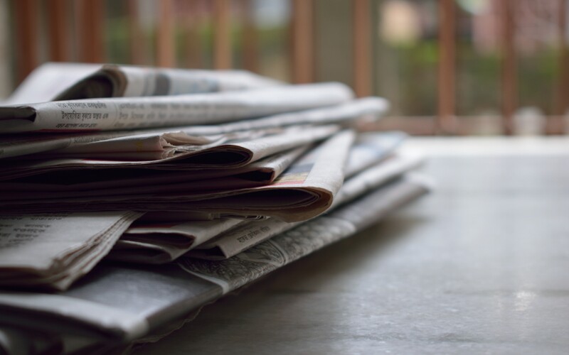 A stack of newspapers.