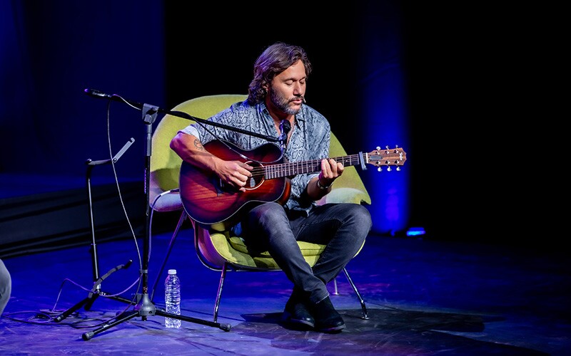 Diego Torres singing on the RootsTech stage.