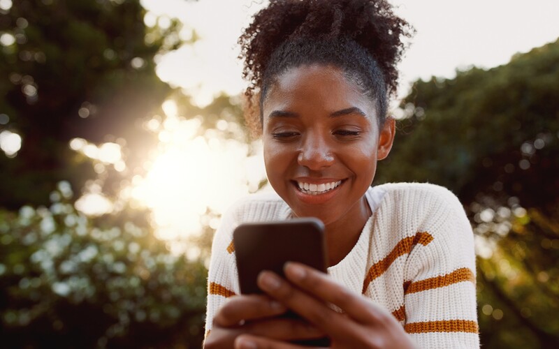 girl looking at phone