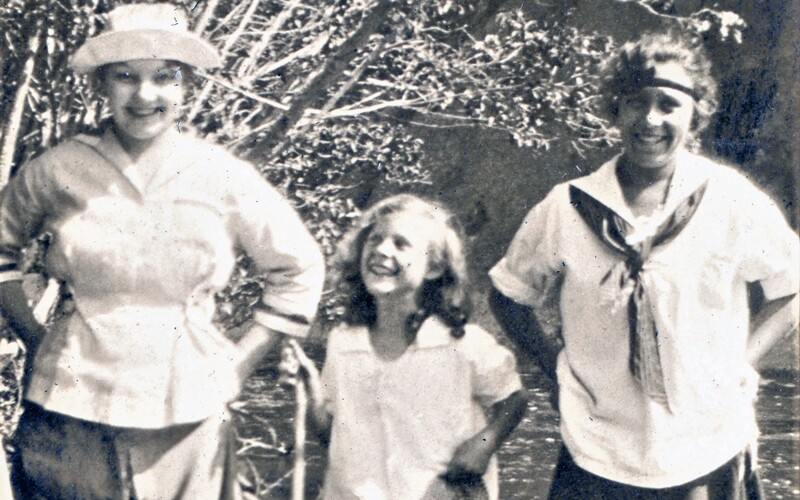 Three girls in the 1920s outside