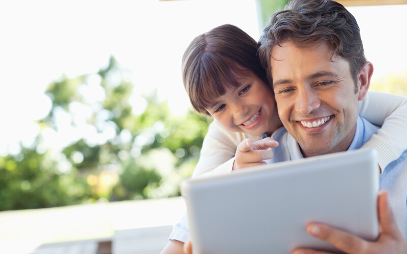 Father learning about his ancestors and sharing with his daughter.