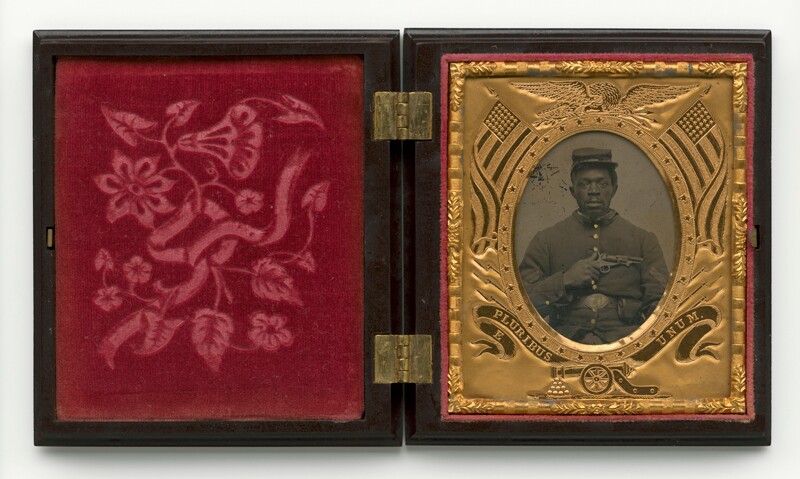 Old black and white image of a black male soldier