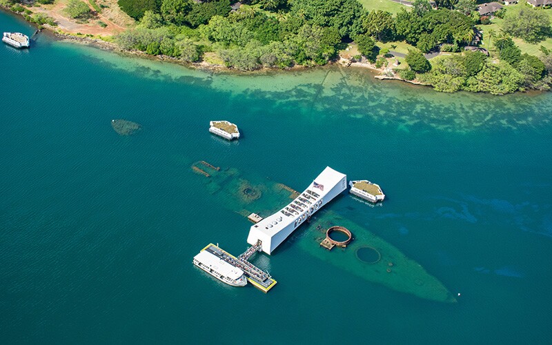 A bird's eye view of the USS Arizona Memorial at Pearl Harbor in Hawaii on Pearl Harbor Remembrance Day.