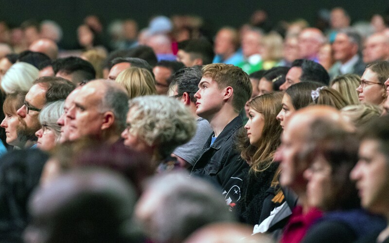 conference attendees listen to an address at RootsTech London 2019.