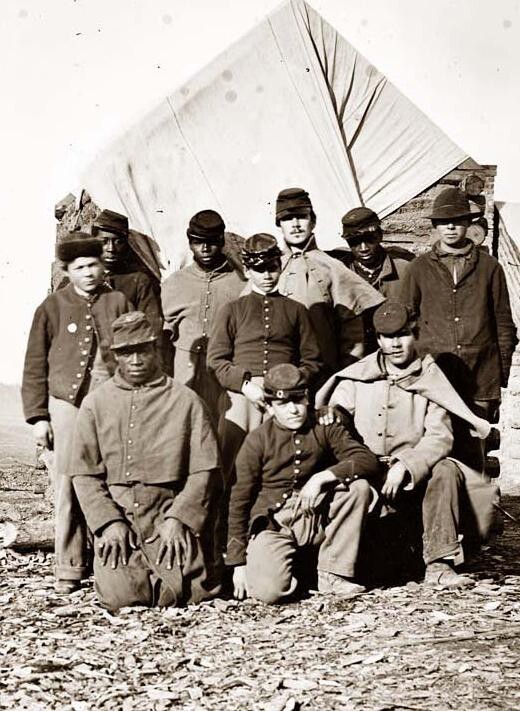 african american troops pose for a picture.