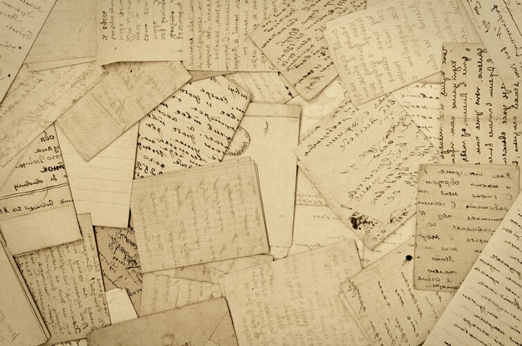 Piles of handwritten documents, hard for computers to read.
