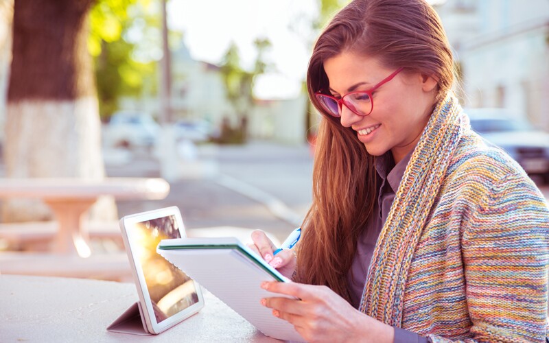A woman looks at her family tree on the computer.